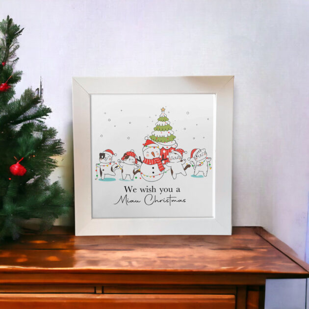 Azulejo decorativo de Natal com desenho de gatinhos com a frase We wish you a Miau Christmas 